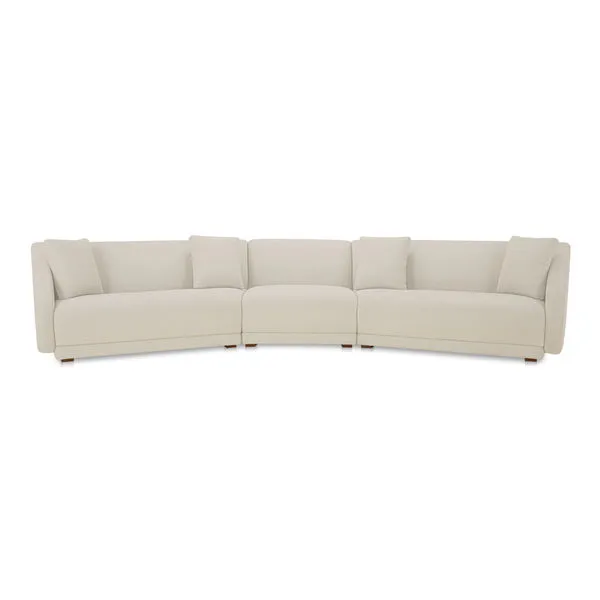 Fraser 3 Piece Modular Sectional in light beige with soft curves and angled seats on minimalist plinth base