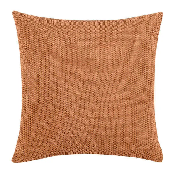 Bassinet suede leather throw pillow in warm brown with handwoven basket weave texture