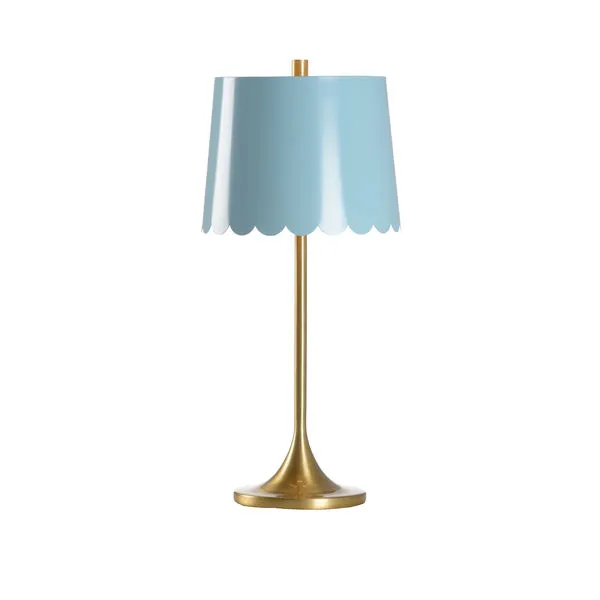 Brass table lamp with slender stem and scalloped blue tole shade with gold interior