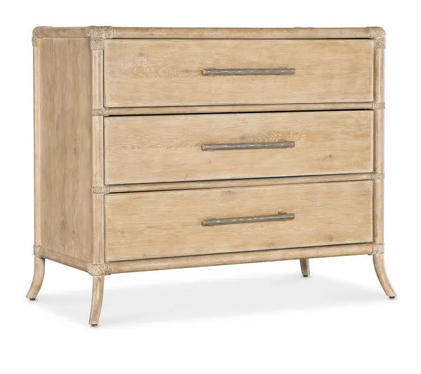 Three-drawer chest in sand-colored wood with curved legs and rope-wrapped corners