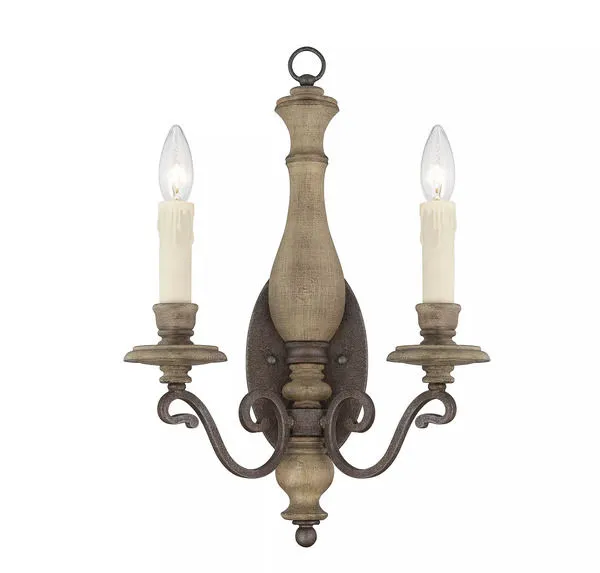 Rustic two-light wall sconce with Fossil Stone finish, elegant curves, and candle-style bulbs