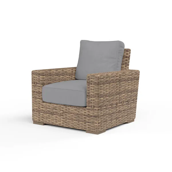 Havana Club Chair with aged tobacco all-weather wicker and gray cushions, boxy design with ample seating