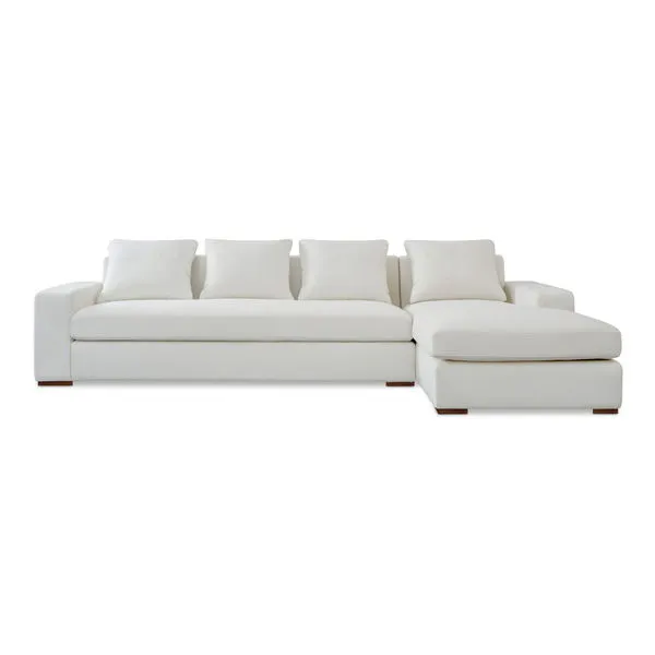 Oversized white Thomas sectional sofa in durable polyester fabric with four removable back cushions and bench-style seat