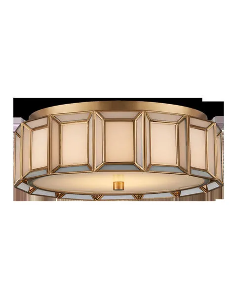 Round flush mount ceiling light with white milk glass panels framed in antique brass metal ribs