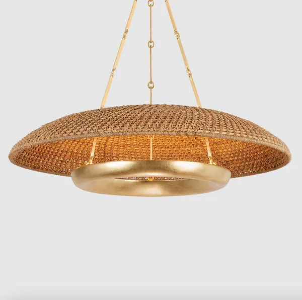 Front view of pendant fully lit showcasing circular rope shade and gold leaf ring diffuser against light background