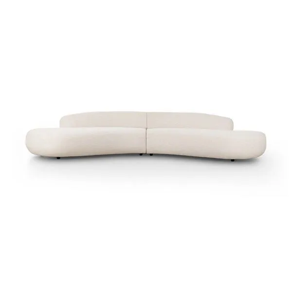 Belen Double Chaise sofa with large amorphous double chaise and smooth flowing curved perimeter back in light upholstery