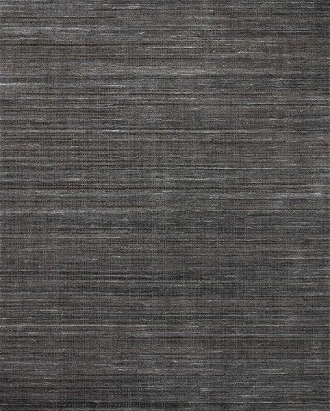 Traditional Jamie Graphite charcoal rug with a subtle abrash pattern in varying shades of dark gray and brown