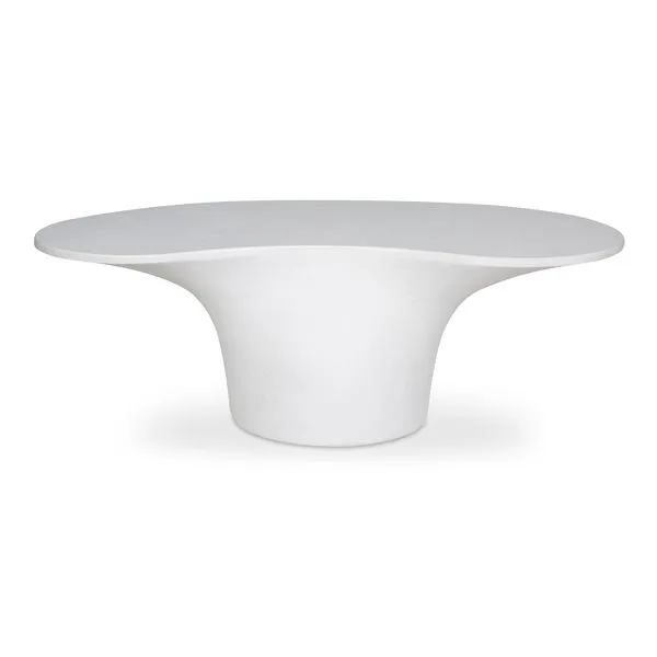 Yumi outdoor coffee table with a white freeform top and a wide pedestal base in glass fiber-reinforced concrete