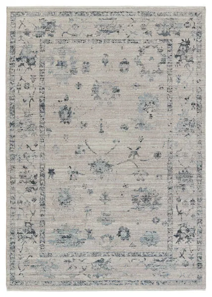 Distressed traditional floral area rug in blue, gray, and cream tones, 9'6" x 12'6" size