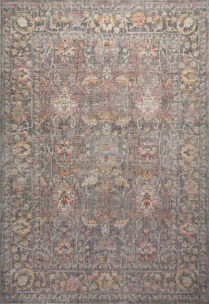 Traditional-style rug with faded multicolor floral and medallion patterns in muted gray, blush, and mustard tones