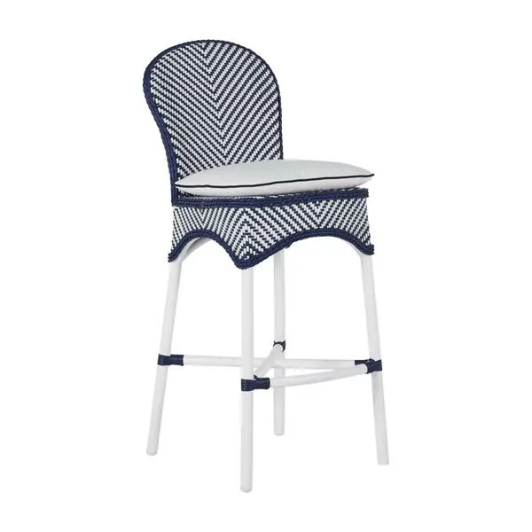 Navy and white woven outdoor bar stool with curved backrest, white frame, and light cushion
