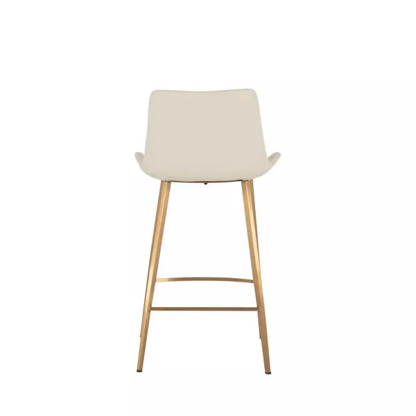 Back view of stool with gently flared white seat and gold legs with footrest