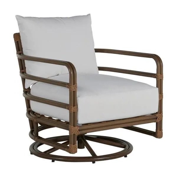 Outdoor swivel rocker chair with brown oak frame and white cushioned seat and back in burlap fabric