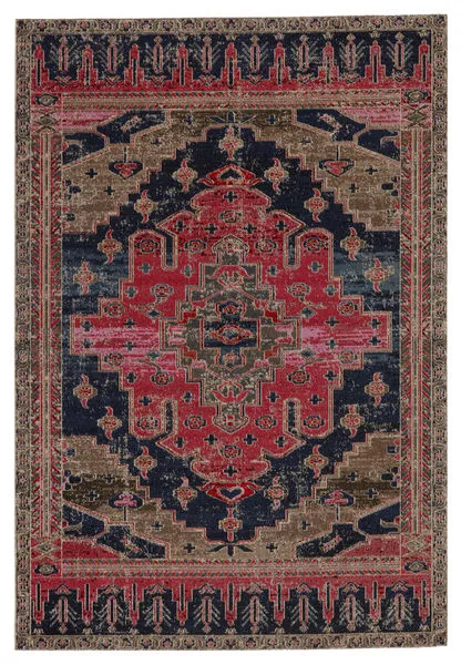 Indoor/outdoor rug with bold tribal medallion design in bright pink, deep blue, gold, gray, and taupe tones