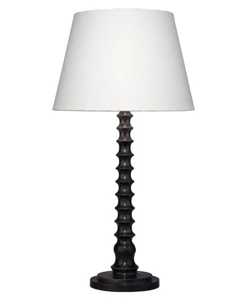 Table lamp with a turned mango wood base in dark finish topped with a tapered white linen slub shade