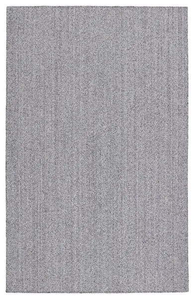 Flatwoven solid black and white indoor/outdoor rug with a heathered dhurrie texture and low-profile design