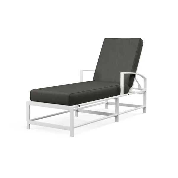 Bristol Chaise outdoor lounger with white aluminum frame, black cushion, gently curved X back and seat, straight channel l...