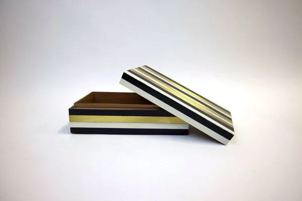 Harper box with lid open, showing inner wood-toned storage space and angled lid placement