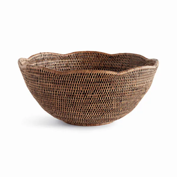Warm brown Burma rattan bowl with tight weave and scalloped edge in round shape