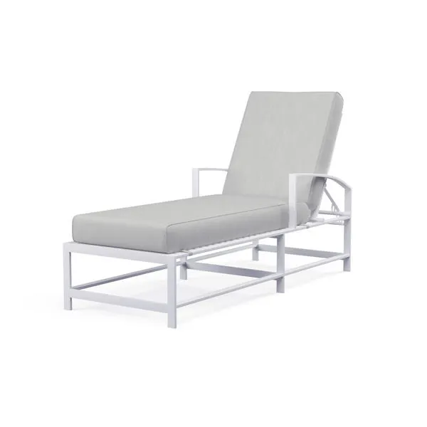 Bristol Chaise outdoor lounger with curved X back and seat, gray cushions, white aluminum frame, straight channel legs