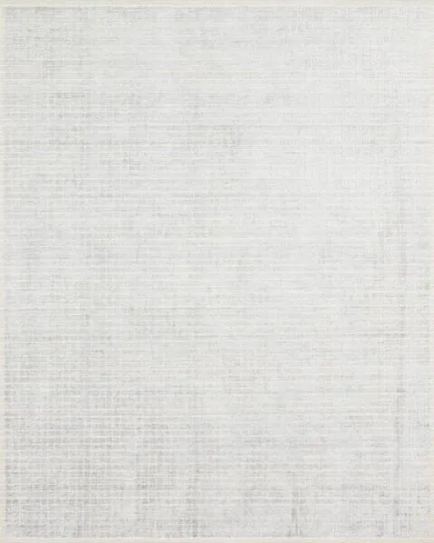 Beverly Silver Sky Rug with a subtle grid pattern in soft silver and gray tones, hand-loomed wool and rayon pile.