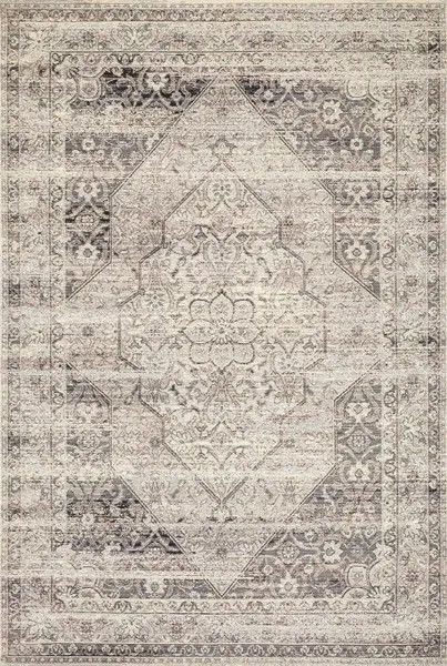 Ivory Mika Stone rug with abstract tribal-inspired pattern in textured polypropylene and polyester yarns