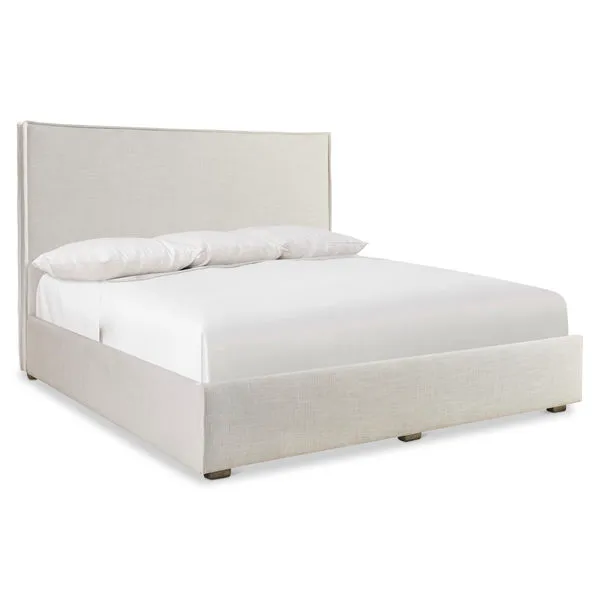Sawyer Storage Panel Bed with light beige fabric upholstery, stitched flanged edges, and wood feet in Morel finish