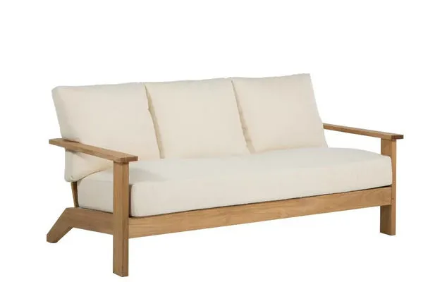 Ashland Teak Sofa with light teak wood frame and three cream-colored cushions for outdoor seating