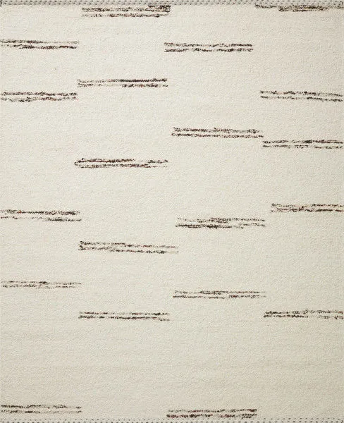 Roman Ivory Granite Rug with ivory background and scattered thin brown horizontal strokes, hand-woven with stitched edge
