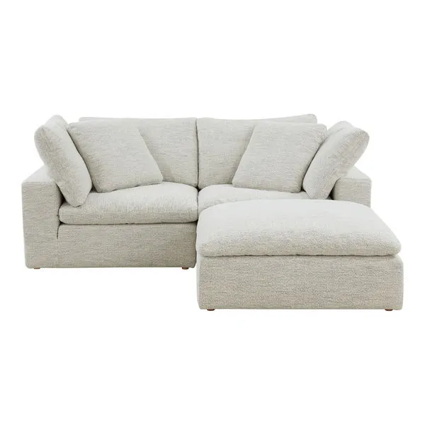 Clay Nook Modular Sectional in light beige NeverFear™ Performance Technology fabric with plush feather-filled cushions and...