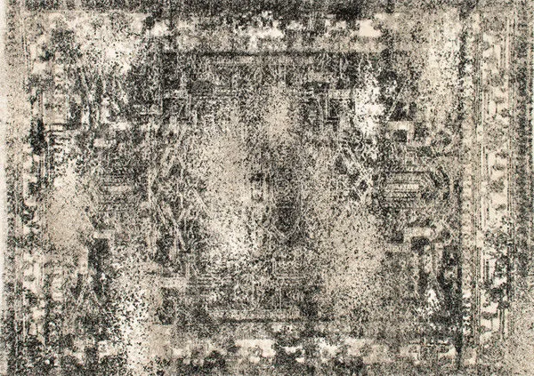 Viera Ash Rug with distressed vintage pattern in ash gray and cream tones, showcasing a graphic high-low pile texture