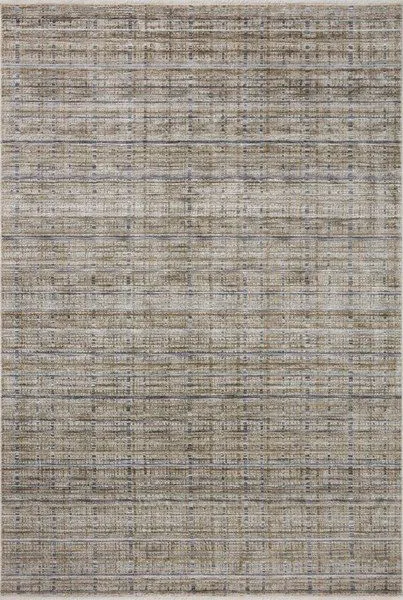 Soho Pebble Charcoal rug with abstract, earth-tone pattern in shades of beige, gray, and charcoal
