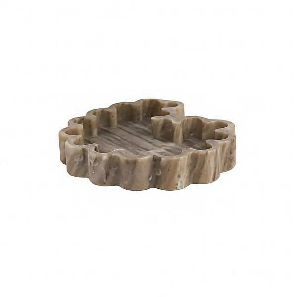 Organic shaped ribbed marble tray in brown with fluid sculptural edges and textured surface