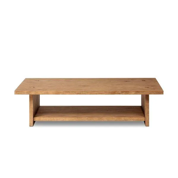Rectangular coffee table made of distressed light-finished oak with natural knots, paneling, and lower shelf