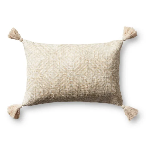 Rectangular ivory pillow with tassels on each corner and subtle textured geometric pattern