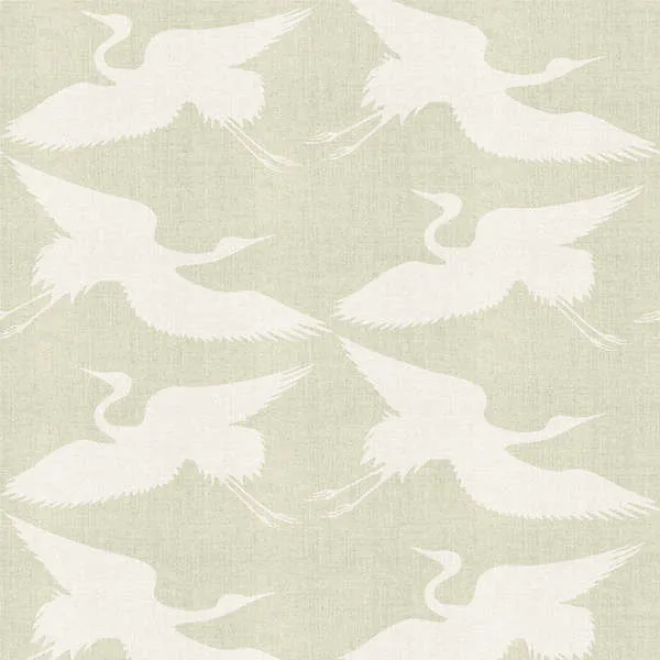 Wallpaper with a eucalyptus green matte finish featuring a repeated pattern of white paper cranes in flight