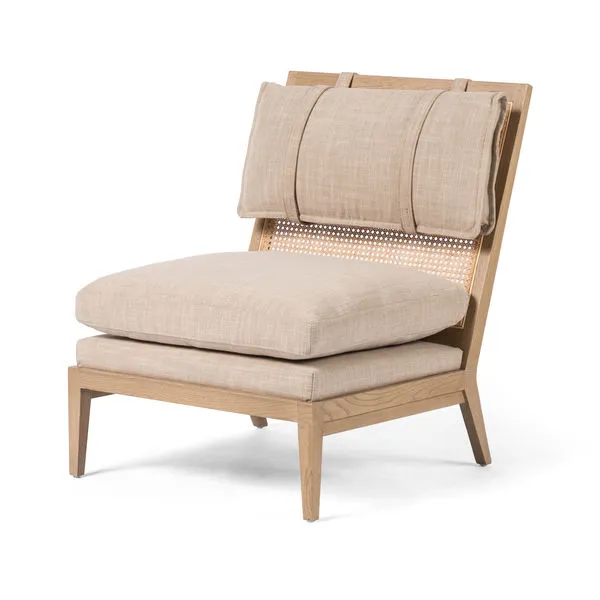 Kenzo Chair with light beige textured fabric cushions and light oak frame featuring cane webbing backrest