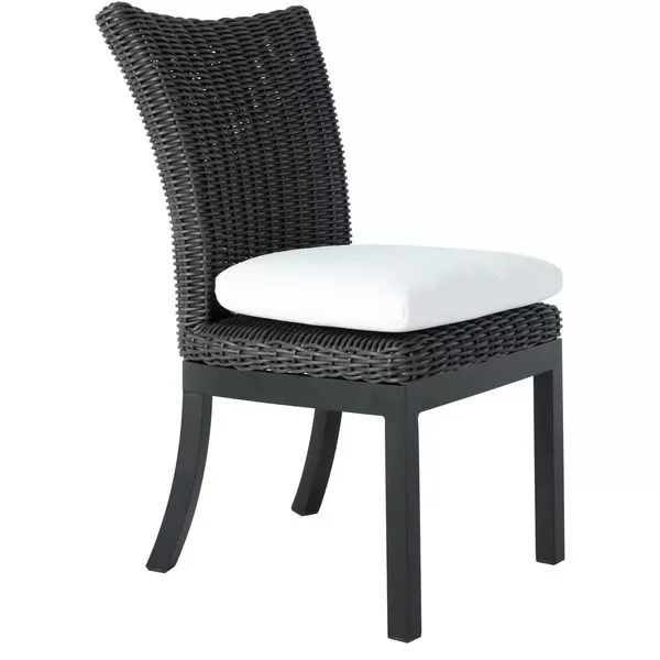 Montecito Dining Side Chair with dark woven rattan back and seat frame, black legs, and white seat cushion