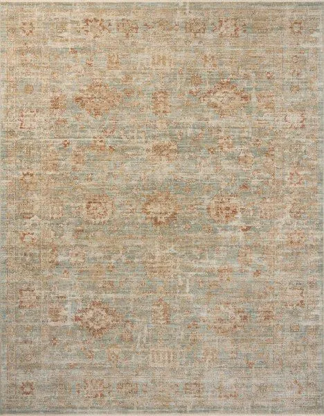 Traditional rectangular rug with muted aqua and terracotta vintage-inspired floral motifs and variable-pile texture