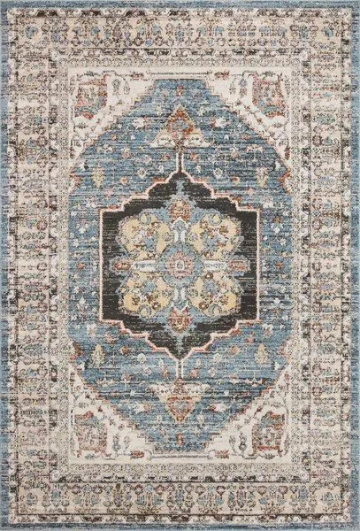 Traditional rug with a blue central medallion and beige borders featuring intricate vintage Turkish Oushak motifs