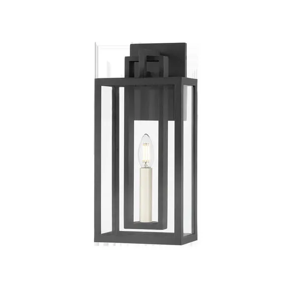 Amire Exterior Wall Sconce with layered rectangular black frame and slender off-white candle encased in clear glass