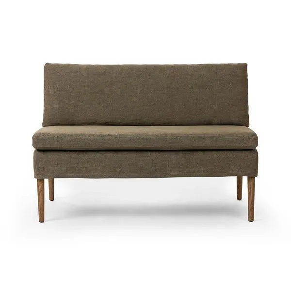 Broadway olive upholstered dining banquette with solid oak tapered legs, straight back cushion, and simple silhouette