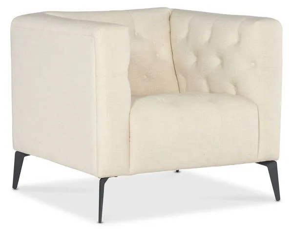 Nicolla Stationary Chair in Baldwin Natural fabric with chesterfield-inspired tufting and matte black tapered metal legs