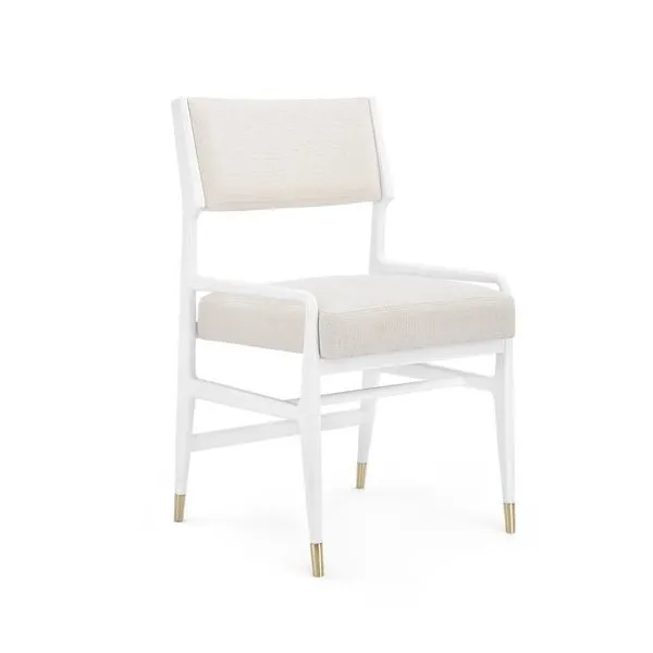 Tamara Arm Chair with white solid frame, beige upholstered seat and back, brass-capped legs