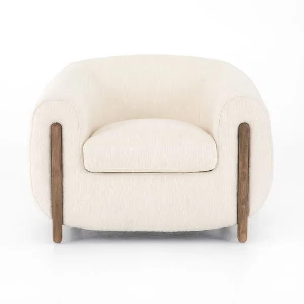 Front view of Lyla Kerbey Ivory Chair highlighting plush seat cushion and curved armrests