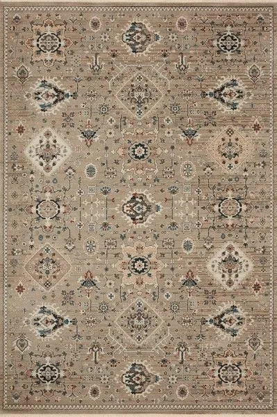 Full overhead view showing overall symmetrical patterned layout with bold geometric and distressed ornamental shapes