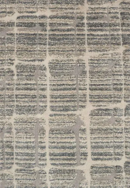 transitional shag rug with over-scaled rectangular pattern in neutral earth tones and varied pile heights