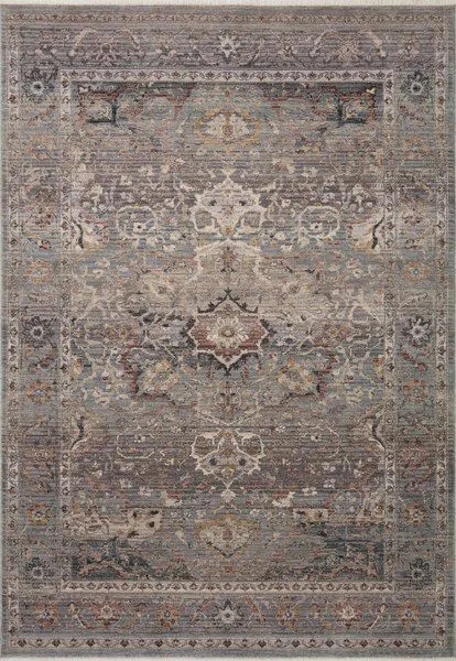 Traditional style Lyra Sky area rug with a detailed watercolor effect in soft blue, gray, and warm earth tones