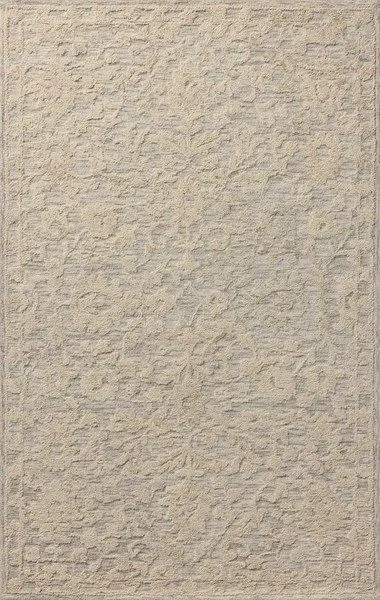 Ivory traditional area rug with a subtle floral pattern in varied loop textures creating depth and soft color gradation