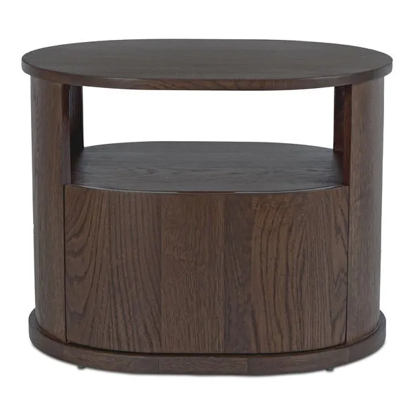 Tommy nightstand in dark brown with solid oak frame and racetrack capsule shape, featuring open shelf and curved drawer